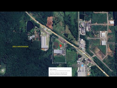 TERRENO COM ÁREA DE 36.538,00m², COM TRÊS EDIFICAÇÕES EM FARROUPILHA