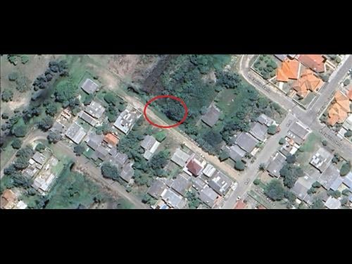 UM TERRENO URBANO, SEM BENFEITORIAS