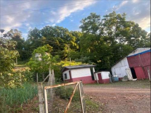 LOTE 001        ÁREA DE TERRAS COM 37.125,00m2 E BENFEITOR...